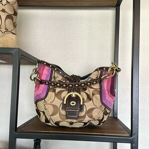 Coach signature jacquard hobo bag with suede trim.